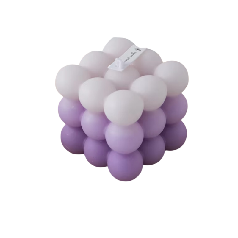 Свічка “Кубик бульбашок“ ручної роботи в фіолетовому кольорі