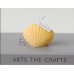 Свічка «Морська мушля» ручної роботи жовтого кольору